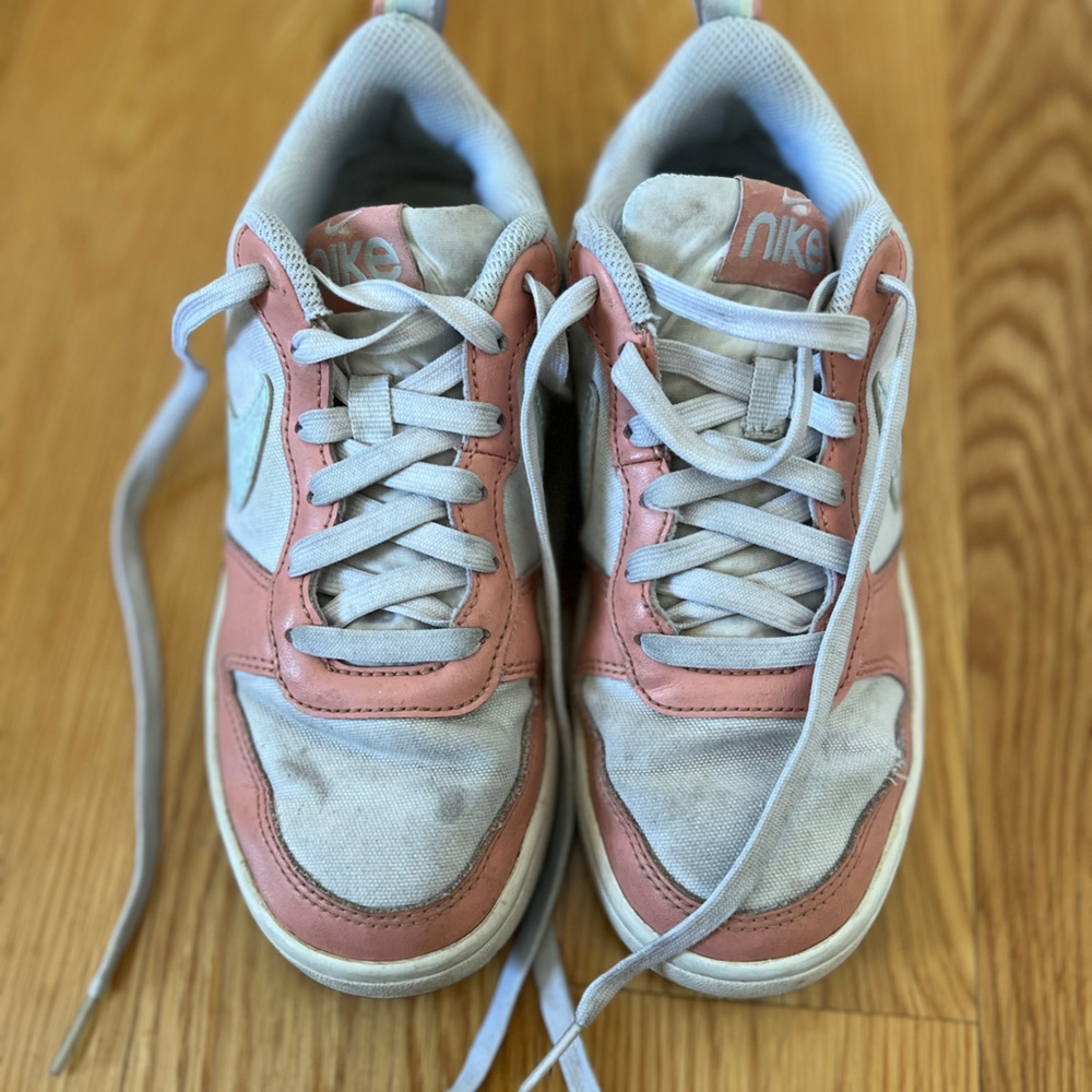 Nike sneakers.  Youth 4.  Need a cleaning but lots of life left
